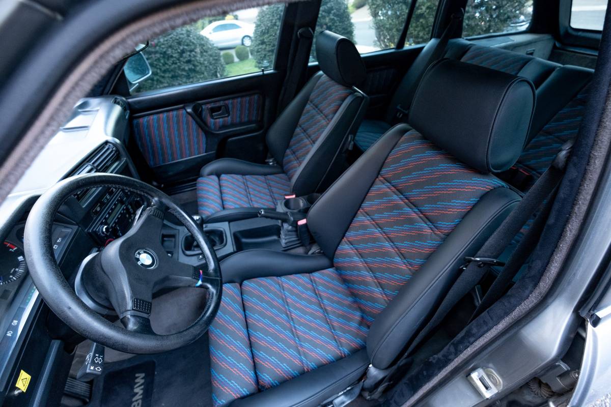 Picture of E30 Touring interior with custom upholstery.